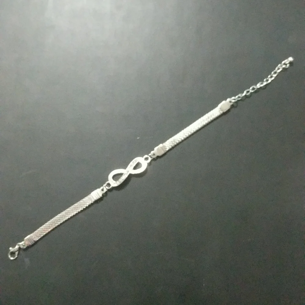 Silver Tone Clear Rhinestone Infinity Symbol Statement Bracelet